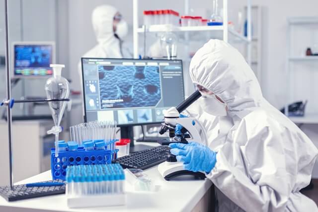 team-medical-personal-wearing-ppe-suit-doing-coronavirus-analysis-modern-laboratory-chemist-researcher-global-pandemic-with-covid-19-checking-sample-biochemistry-lab